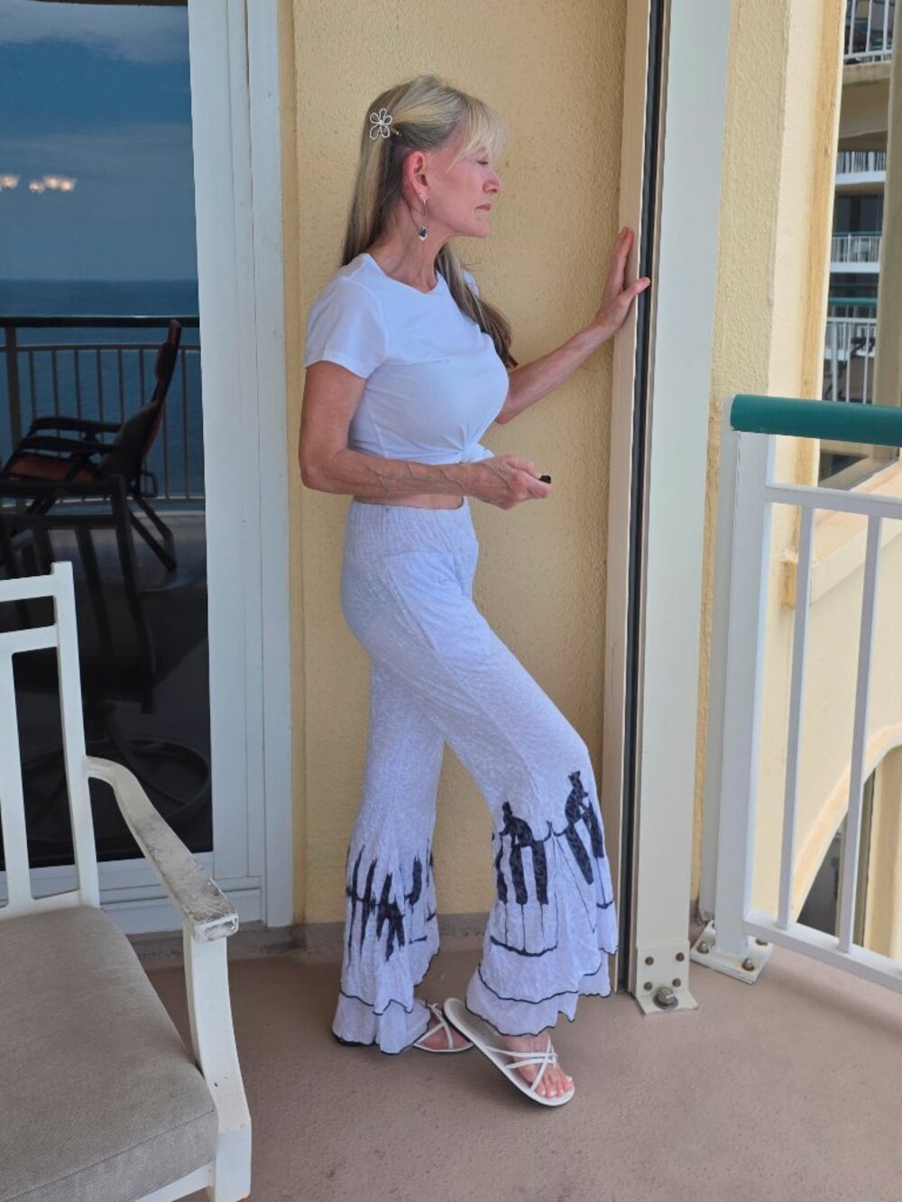 Ruffled lightweight white pants.